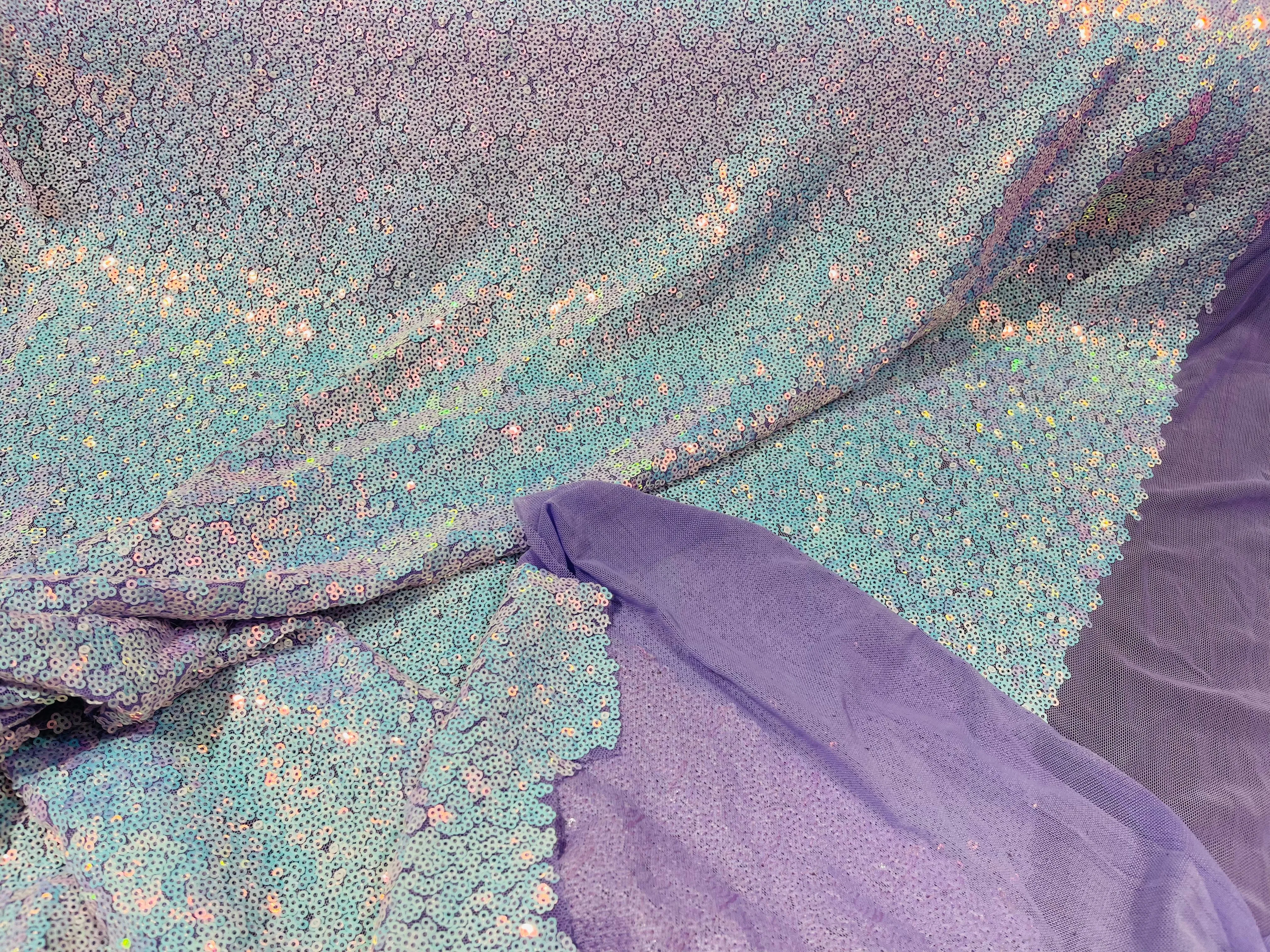 Aqua Iridescent Mini Glitz Sequins on a Lilac 4 Way Stretch Mesh-Sold By The Yard.
