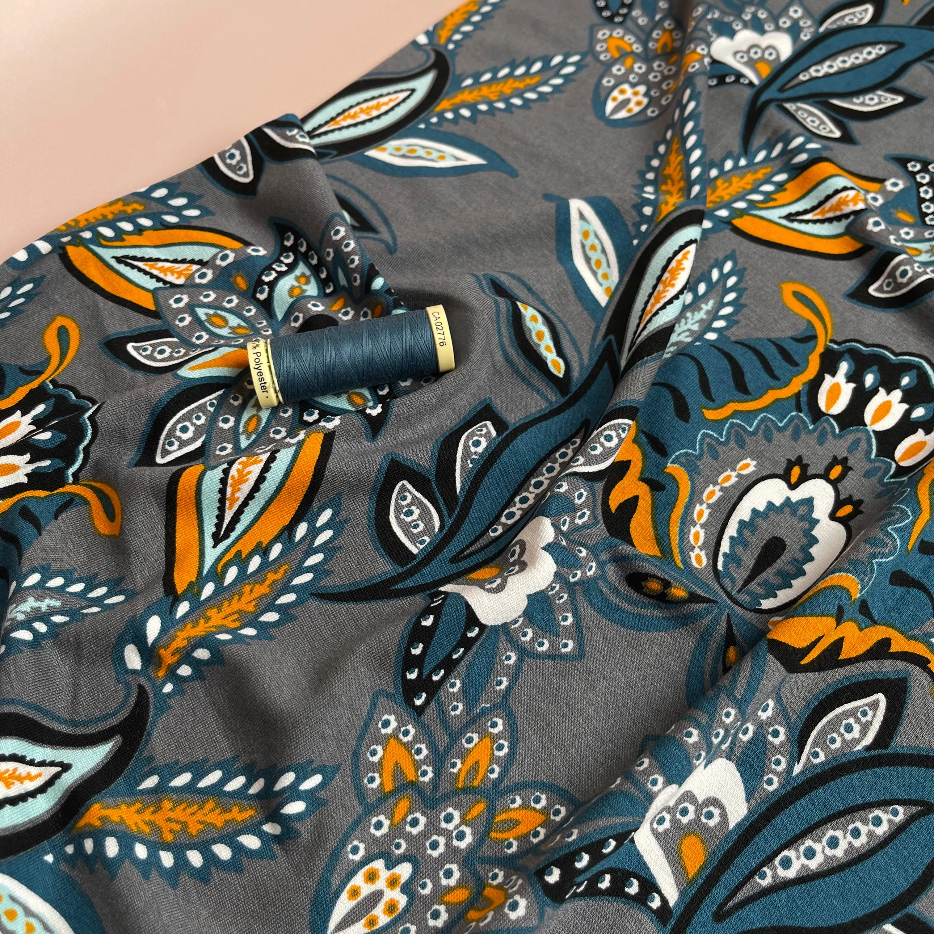 Blue Paisley on Grey Viscose Jersey Fabric