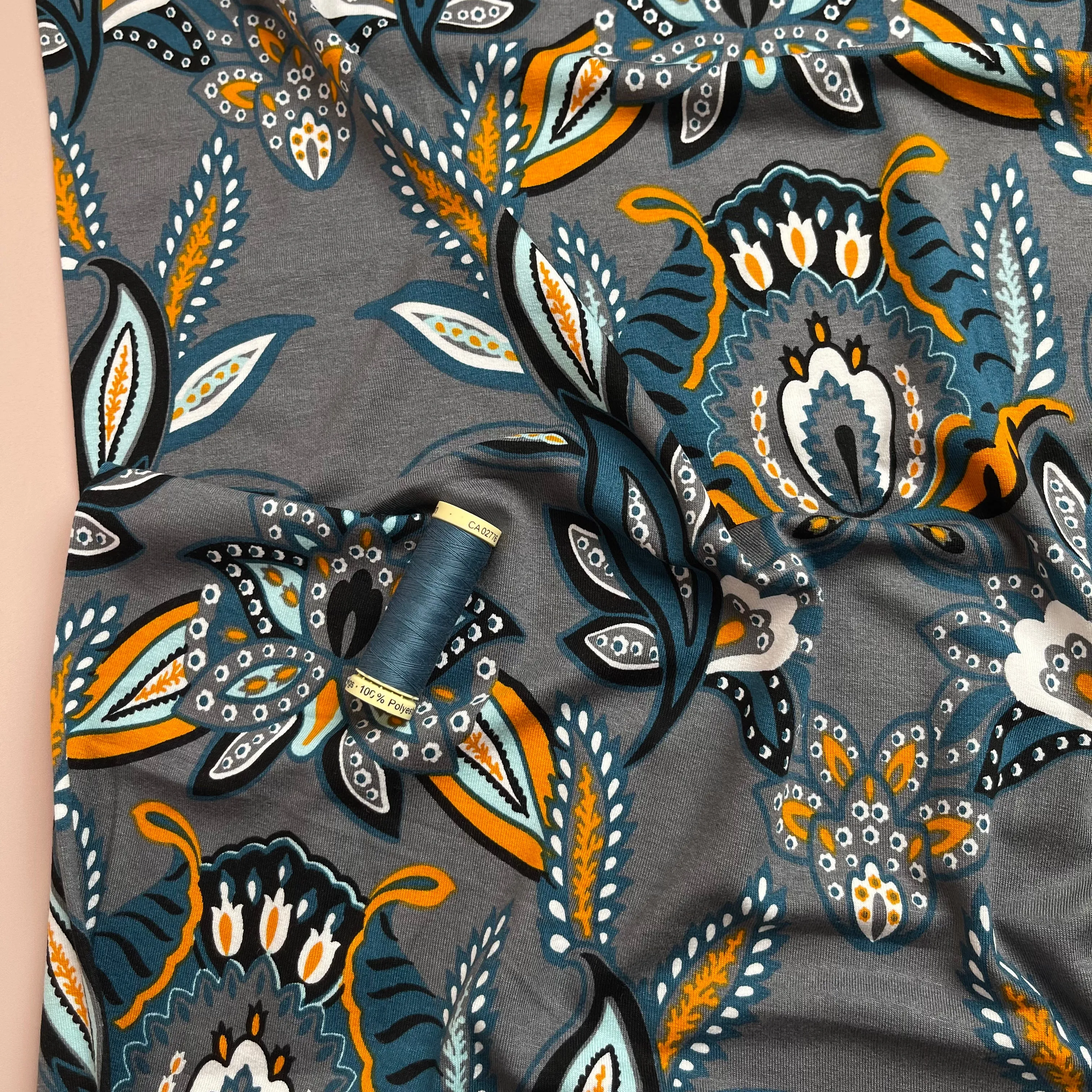 Blue Paisley on Grey Viscose Jersey Fabric