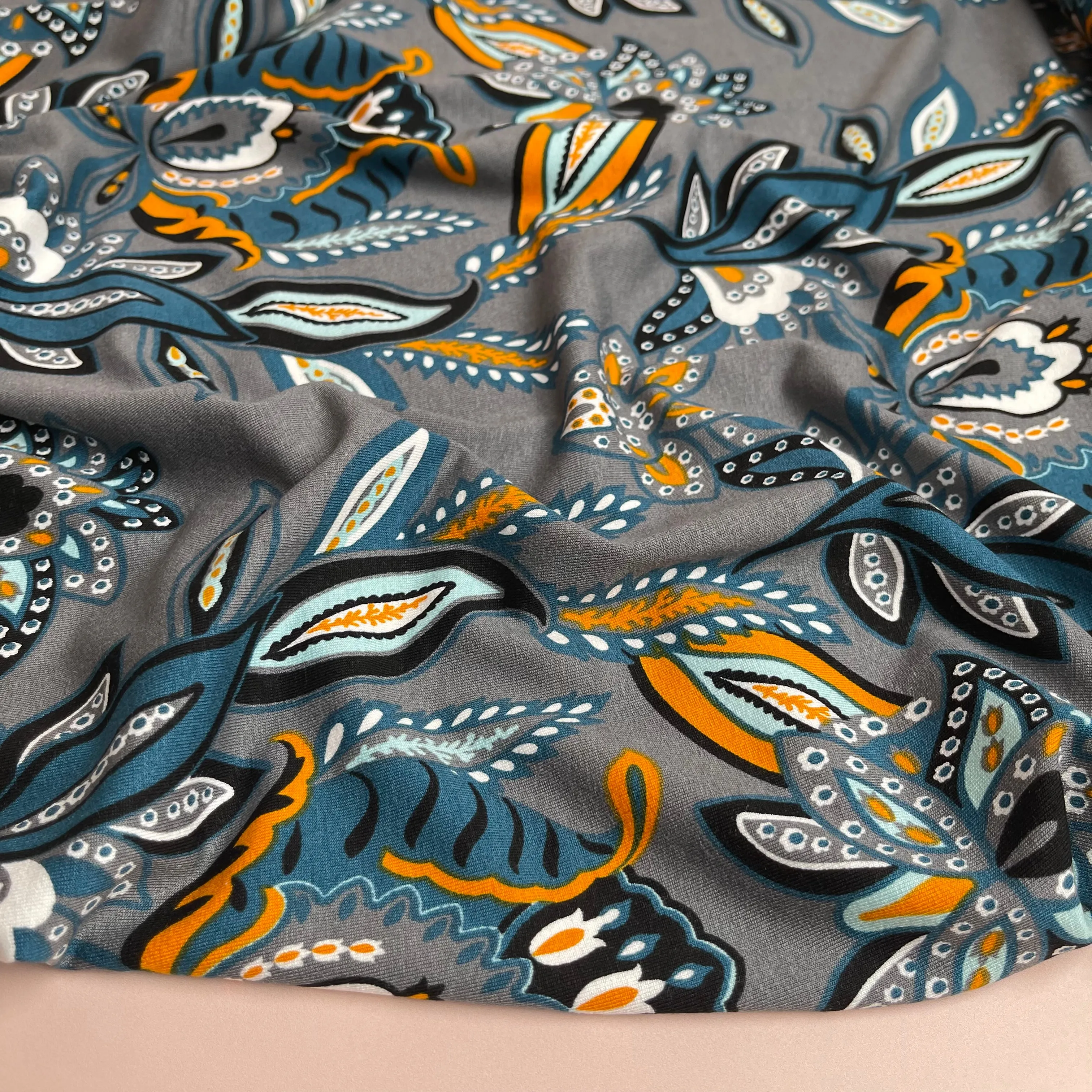 Blue Paisley on Grey Viscose Jersey Fabric