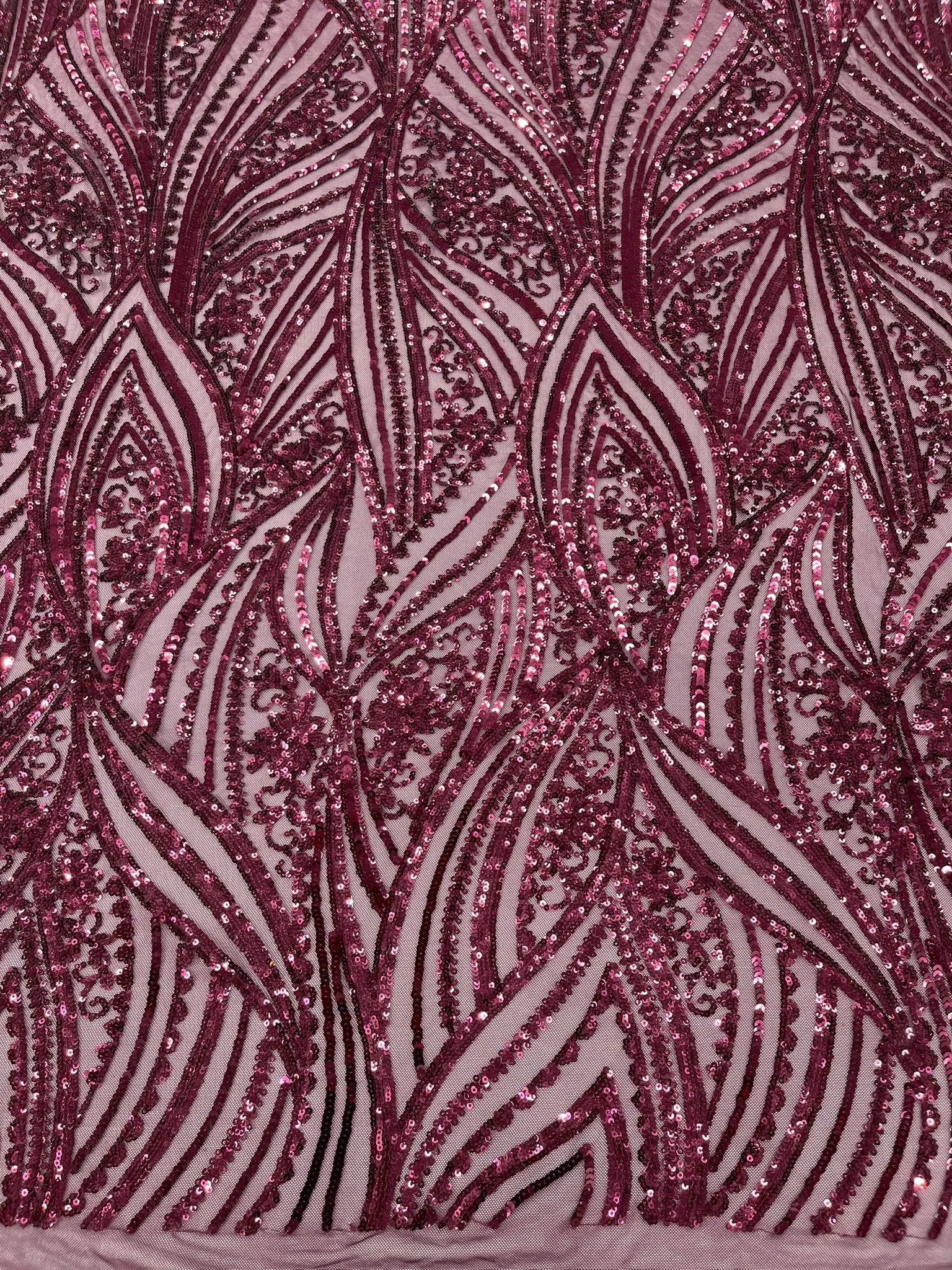 Geometric Feather wing shiny sequin design on a 4 way stretch mesh Fabric-old by the yard.