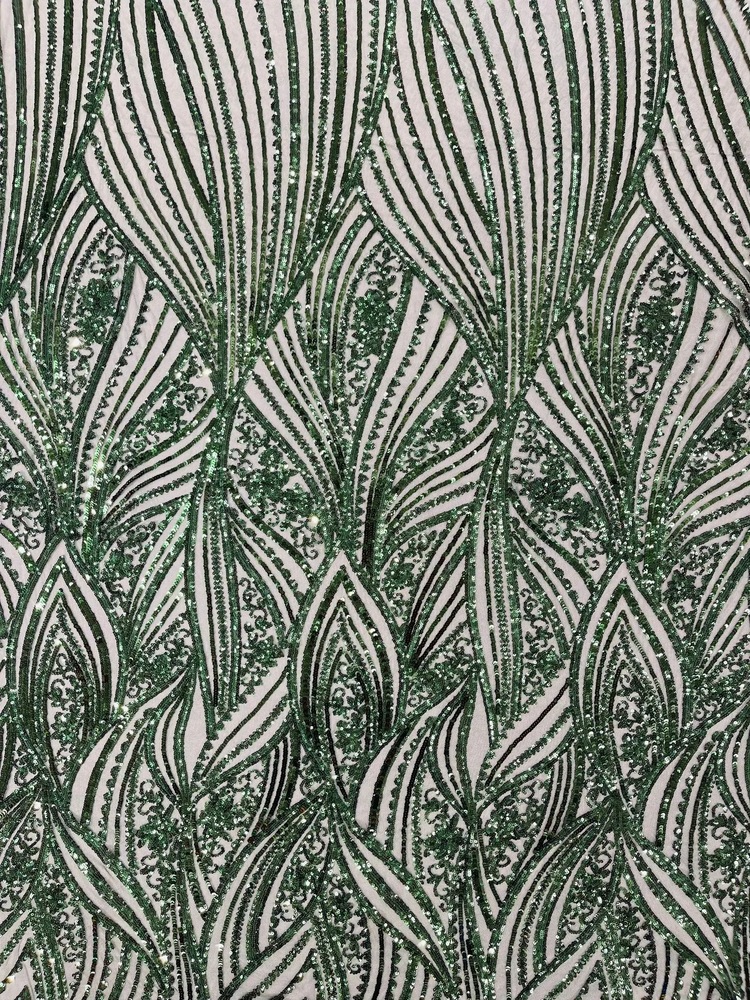 Geometric Feather wing shiny sequin design on a 4 way stretch mesh Fabric-old by the yard.