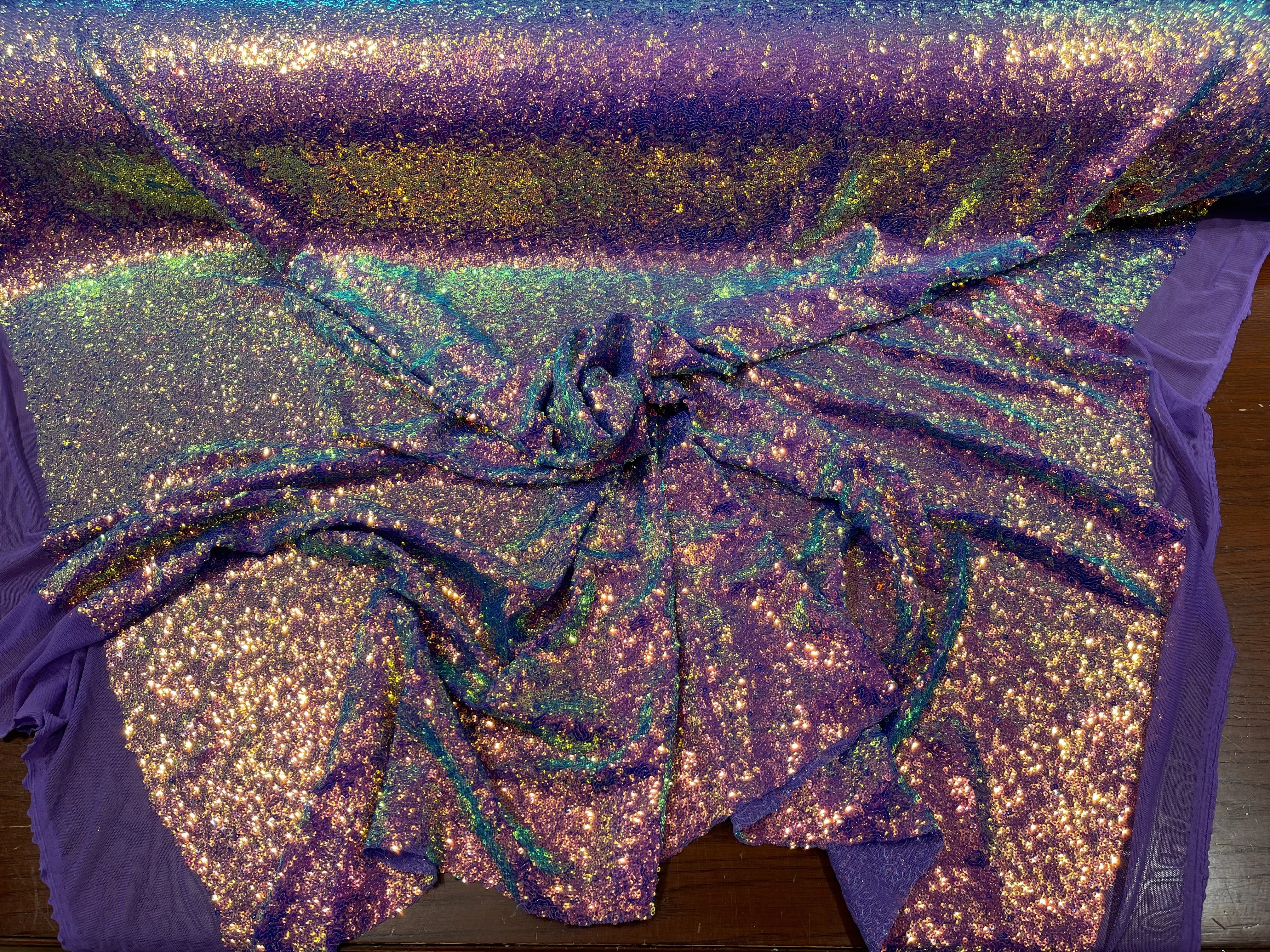 Lavender Iridescent Mini Glitz Sequins on a Purple 4 Way Stretch Mesh-Sold By The Yard.
