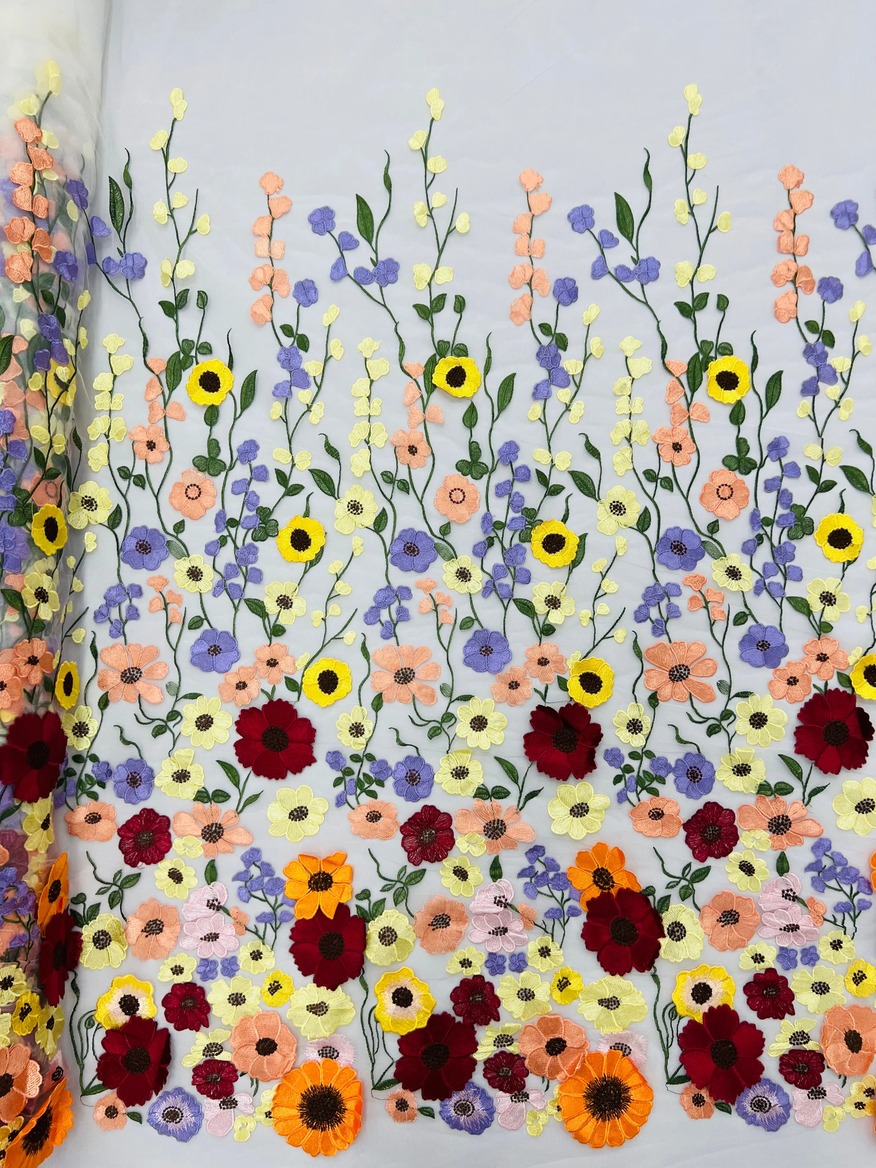 Multi color Sun flower 3d design embroider in a mesh lace-sold by the yard.